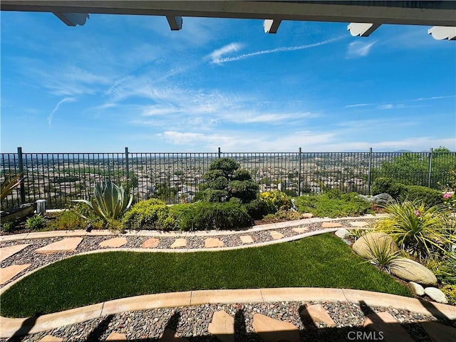 view of yard featuring fence