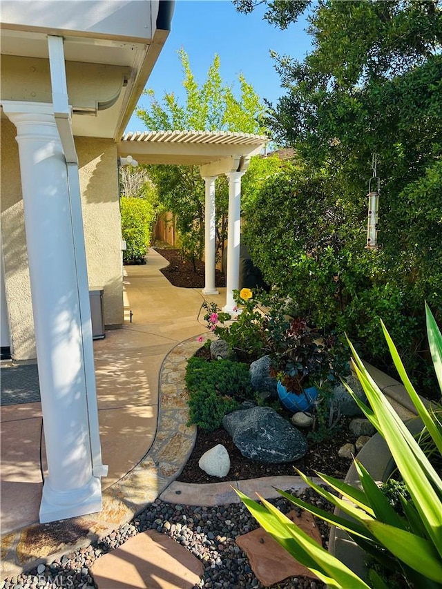 view of patio featuring fence