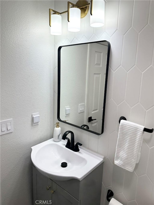 34036 Galleron St, Temecula, CA 92592 - bathroom with vanity and tile walls