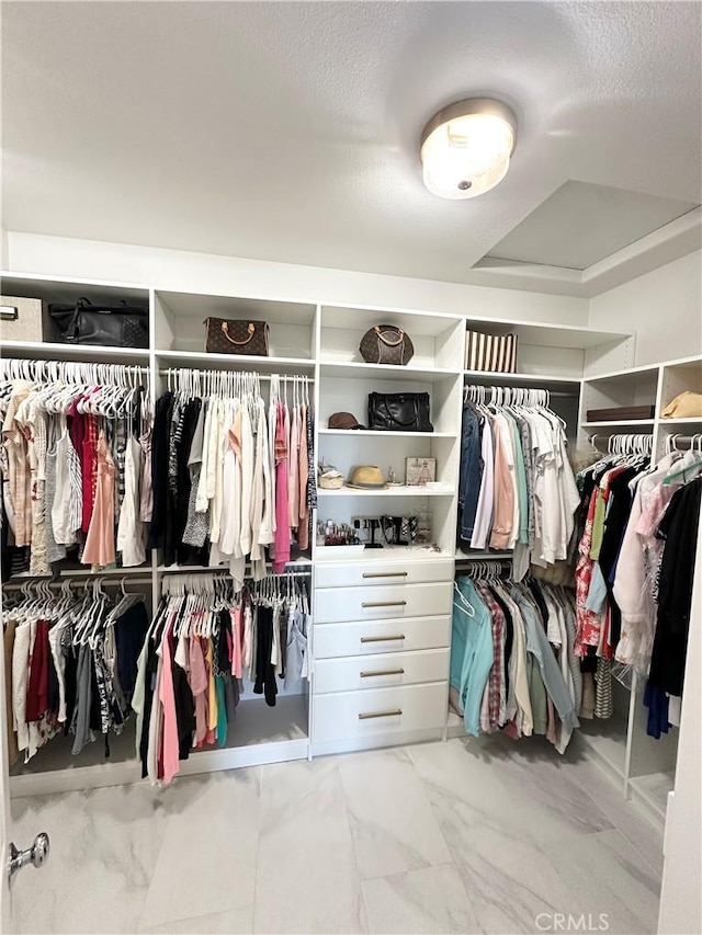 34036 Galleron St, Temecula, CA 92592 - spacious closet featuring marble look tile flooring
