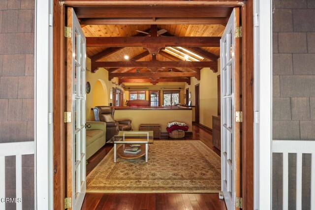 interior space featuring beam ceiling
