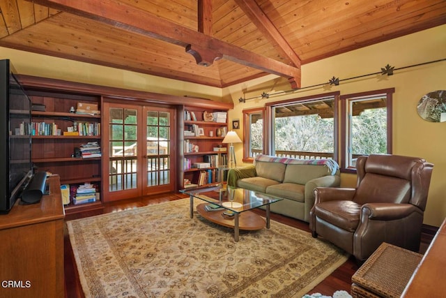 living area with lofted ceiling with beams, wood finished floors, and wood ceiling
