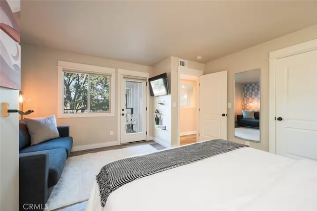 8035 Santa Rosa Rd, Atascadero, CA 93422 - bedroom featuring access to exterior and baseboards