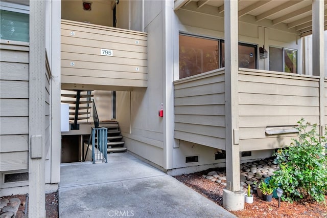view of exterior entry with crawl space