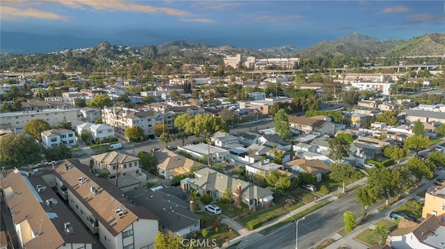 drone / aerial view with a residential view and a mountain view