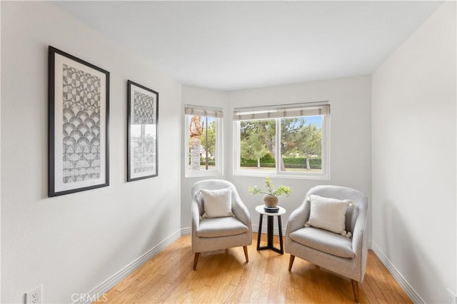 10 Cedarlake Unit 4, Irvine, CA 92614 - sitting room with baseboards and light wood-style flooring