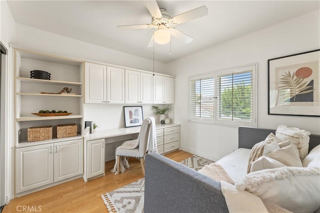 10 Cedarlake Unit 4, Irvine, CA 92614 - office area with light wood-type flooring, baseboards, built in study area, and ceiling fan