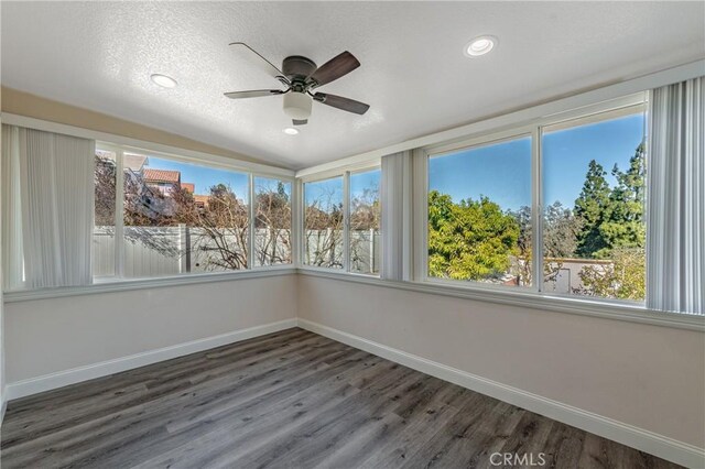 429 Somerset Cir, Corona, CA 92879 - unfurnished sunroom with baseboards, healthy amount of natural light, wood finished floors, and recessed lighting