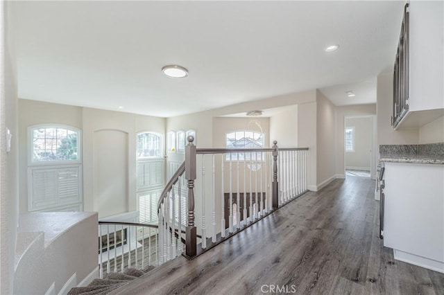 429 Somerset Cir, Corona, CA 92879 - hall featuring wood finished floors, an upstairs landing, baseboards, a chandelier, and recessed lighting