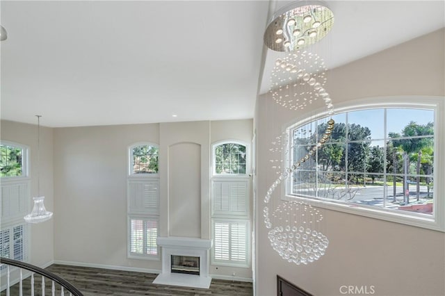 429 Somerset Cir, Corona, CA 92879 - foyer featuring a chandelier, wood finished floors, and baseboards
