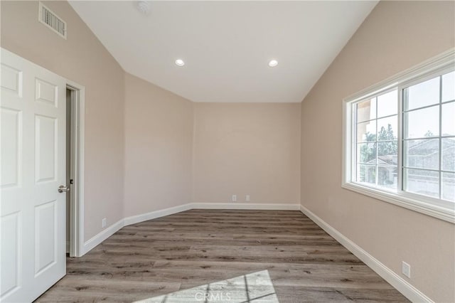 429 Somerset Cir, Corona, CA 92879 - spare room featuring vaulted ceiling, wood finished floors, recessed lighting, and baseboards