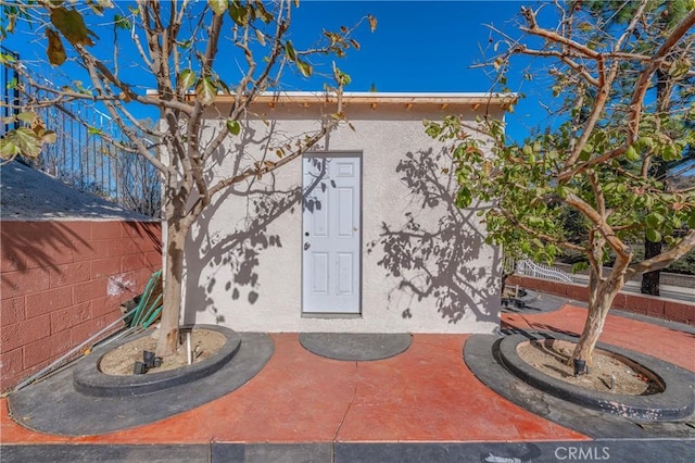 429 Somerset Cir, Corona, CA 92879 - property entrance with stucco siding