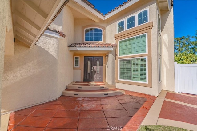 429 Somerset Cir, Corona, CA 92879 - doorway to property with stucco siding and a tiled roof