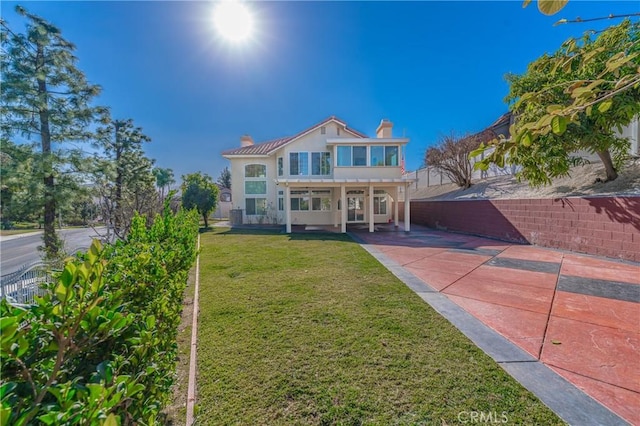 429 Somerset Cir, Corona, CA 92879 - view of front of home featuring a chimney, stucco siding, and a patio