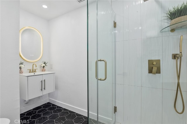 12635 Dorina Pl, Granada Hills, CA 91344 - full bathroom featuring a shower stall, vanity, and baseboards
