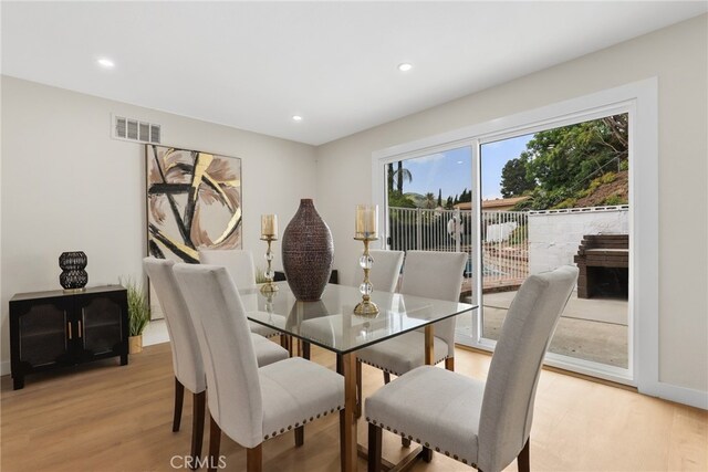 12635 Dorina Pl, Granada Hills, CA 91344 - dining space with light wood-style flooring, recessed lighting, and baseboards