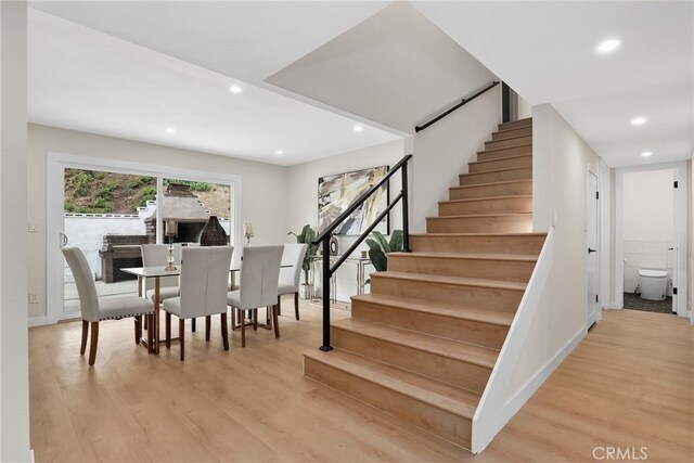 12635 Dorina Pl, Granada Hills, CA 91344 - stairway with wood finished floors, recessed lighting, and baseboards