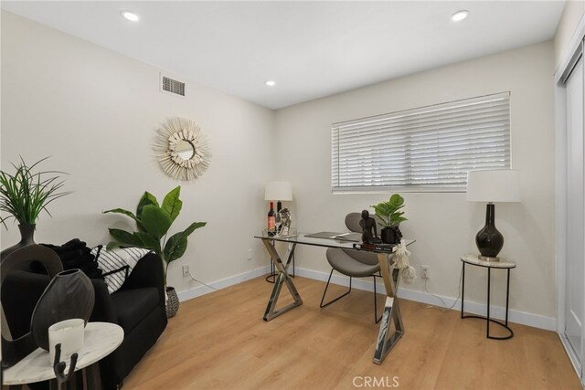 12635 Dorina Pl, Granada Hills, CA 91344 - home office featuring wood finished floors, recessed lighting, and baseboards