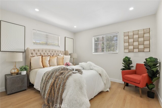 12635 Dorina Pl, Granada Hills, CA 91344 - bedroom with light wood-style flooring, baseboards, and recessed lighting