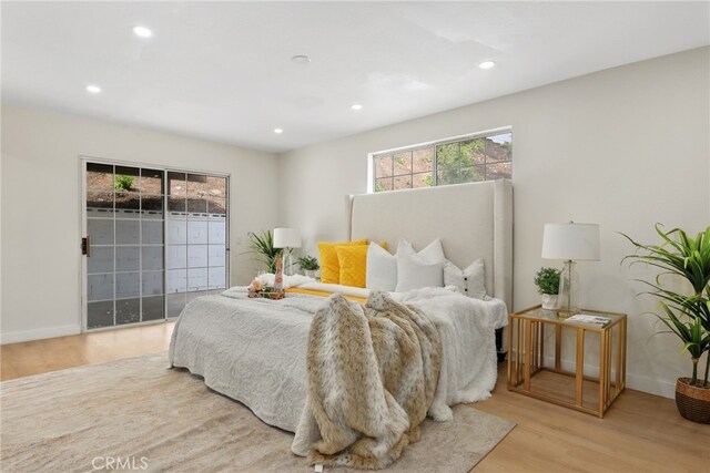 12635 Dorina Pl, Granada Hills, CA 91344 - bedroom featuring multiple windows, wood finished floors, recessed lighting, and baseboards