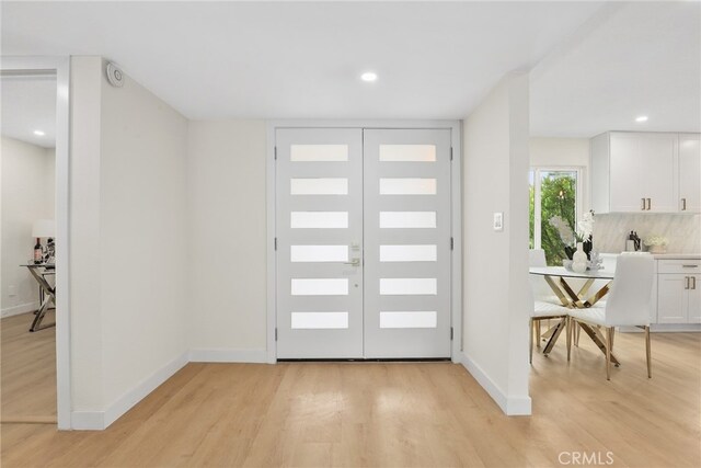 12635 Dorina Pl, Granada Hills, CA 91344 - foyer entrance featuring light wood-style floors, baseboards, and recessed lighting