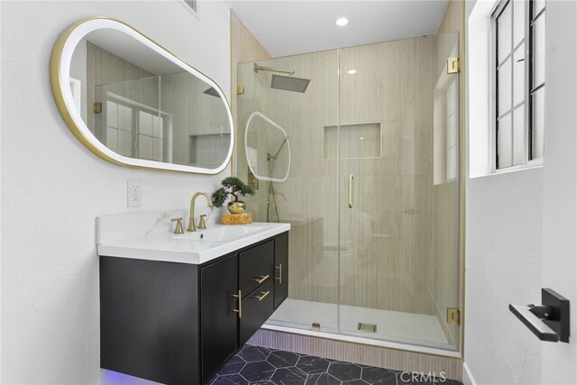 12635 Dorina Pl, Granada Hills, CA 91344 - bathroom with vanity, a stall shower, and tile patterned floors