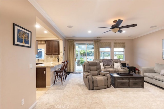 30304 Vercors St, Murrieta, CA 92563 - living area with ornamental molding, ceiling fan, light colored carpet, and recessed lighting