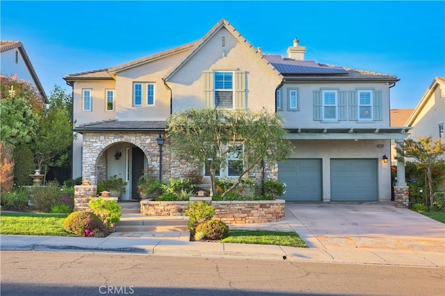 30304 Vercors St, Murrieta, CA 92563 - traditional-style home with stucco siding, roof mounted solar panels, driveway, a chimney, and a garage