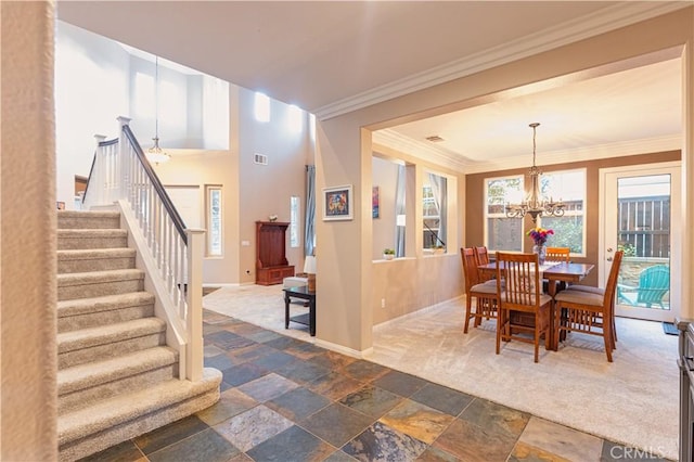 30304 Vercors St, Murrieta, CA 92563 - dining area featuring a chandelier, stairs, baseboards, healthy amount of natural light, and ornamental molding