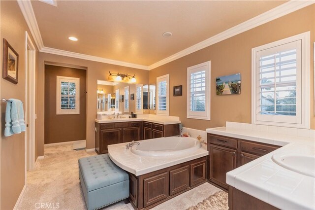 30304 Vercors St, Murrieta, CA 92563 - bathroom featuring ornamental molding, a garden tub, two vanities, and baseboards