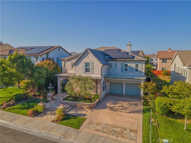 30304 Vercors St, Murrieta, CA 92563 - traditional home featuring stucco siding, a garage, roof mounted solar panels, driveway, and fence