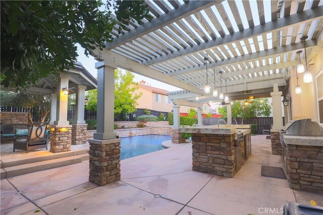 30304 Vercors St, Murrieta, CA 92563 - view of patio with a fenced backyard, an outdoor kitchen, a pergola, and a grill