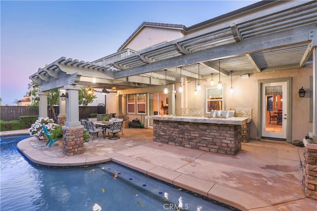 30304 Vercors St, Murrieta, CA 92563 - view of swimming pool featuring a pergola, fence, a patio, and exterior kitchen