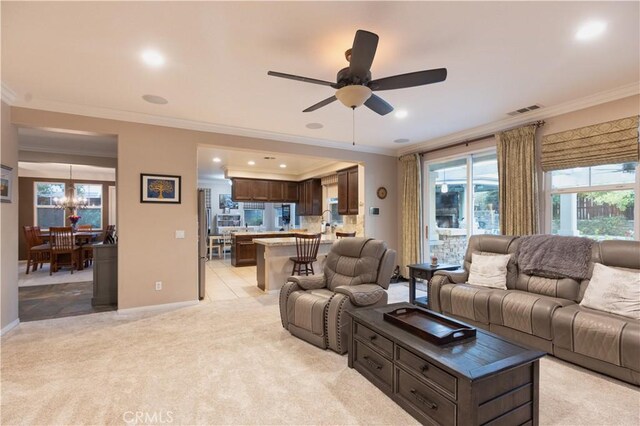 30304 Vercors St, Murrieta, CA 92563 - living area featuring ceiling fan, crown molding, light carpet, a chandelier, and recessed lighting