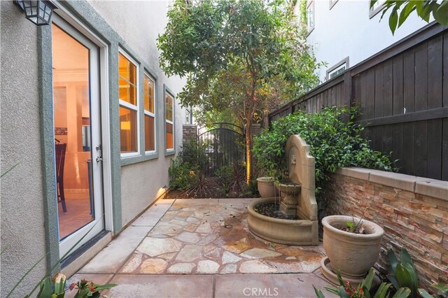30304 Vercors St, Murrieta, CA 92563 - view of patio / terrace with a fenced backyard and a gate