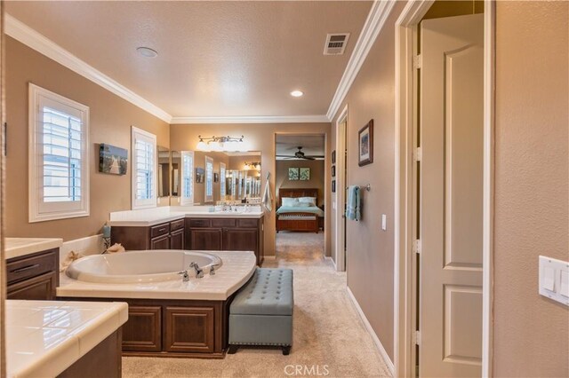 30304 Vercors St, Murrieta, CA 92563 - ensuite bathroom featuring ornamental molding, a garden tub, ceiling fan, and vanity