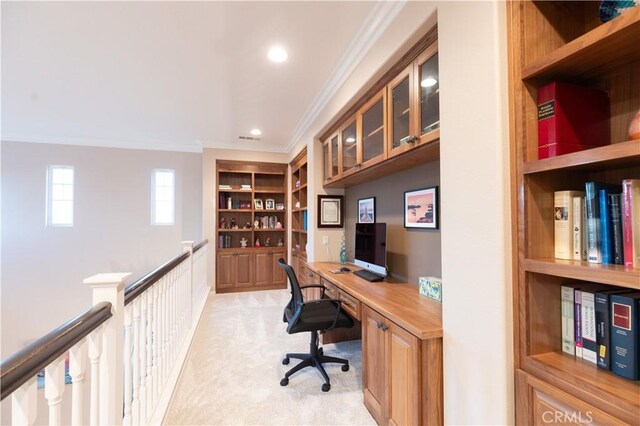 30304 Vercors St, Murrieta, CA 92563 - home office with crown molding, built in desk, built in shelves, light colored carpet, and recessed lighting
