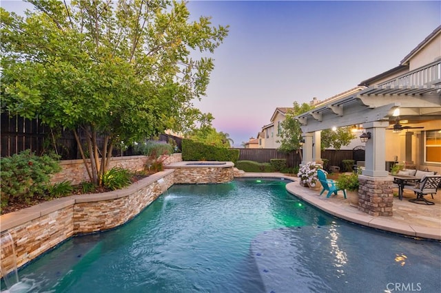 30304 Vercors St, Murrieta, CA 92563 - pool at dusk featuring a fenced backyard, a patio, and a pool with connected hot tub