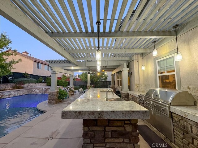 30304 Vercors St, Murrieta, CA 92563 - view of patio / terrace with a fenced backyard, an outdoor kitchen, a pergola, and a bar