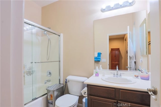 30304 Vercors St, Murrieta, CA 92563 - full bathroom featuring bath / shower combo with glass door, toilet, and vanity
