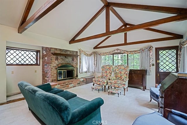 living room with high vaulted ceiling, beamed ceiling, carpet flooring, baseboards, and a brick fireplace