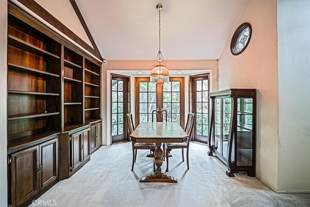 419 Lytle Ln, Lytle Creek, CA 92358 - dining room with lofted ceiling, french doors, and light colored carpet