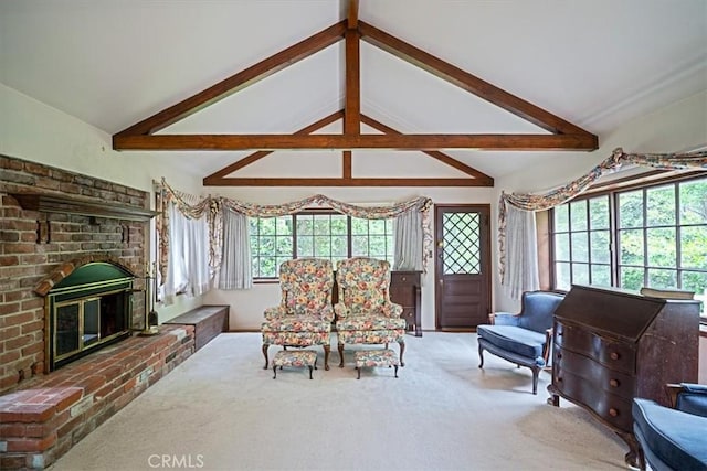 living area with a fireplace, carpet, and lofted ceiling with beams