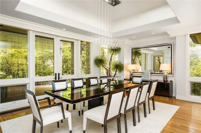 sunroom / solarium featuring a notable chandelier and french doors