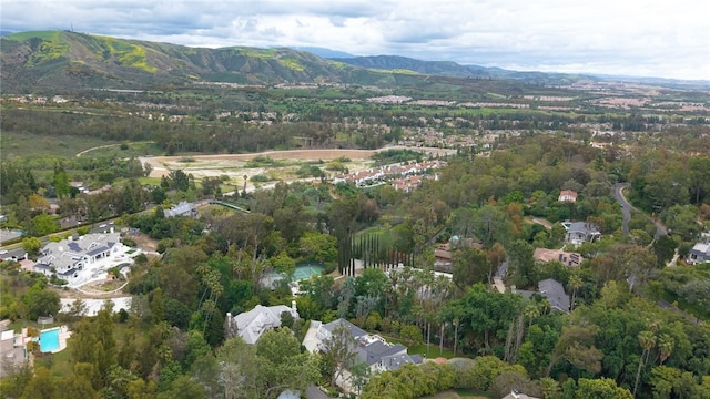 aerial view with a mountain view and a residential view