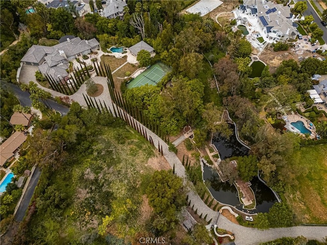 birds eye view of property with a residential view