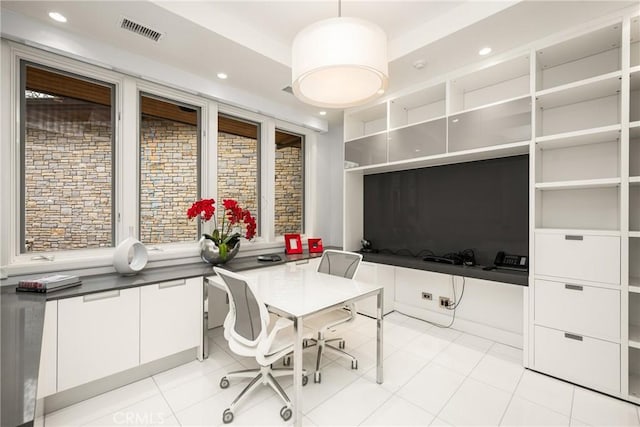 office with light tile patterned floors, a tray ceiling, visible vents, and recessed lighting