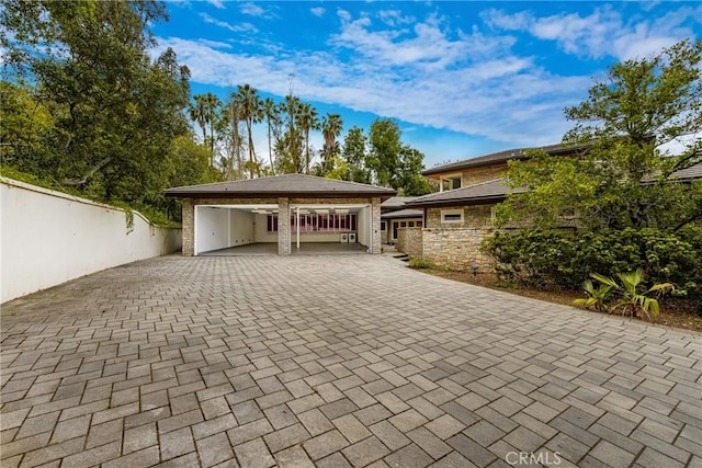 garage featuring driveway