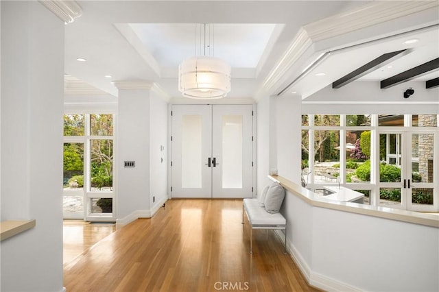 entrance foyer with recessed lighting, wood finished floors, baseboards, and french doors