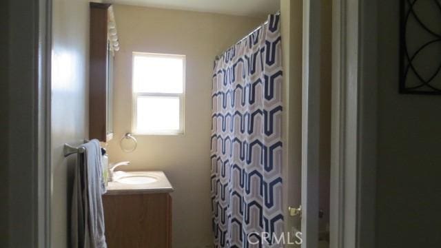 506 N Sunset Ave, Azusa, CA 91702 - full bathroom with vanity and a shower with shower curtain